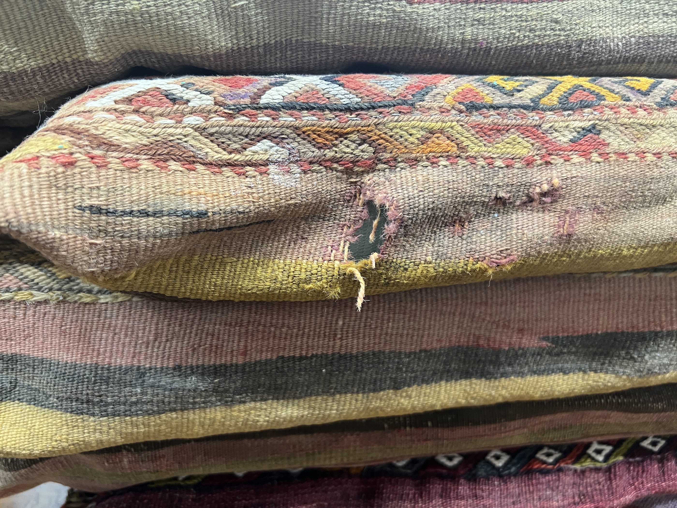 Five Kilim cushions, largest 106 x 51cm